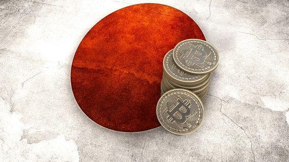 Прапор Японії і монети Bitcoin