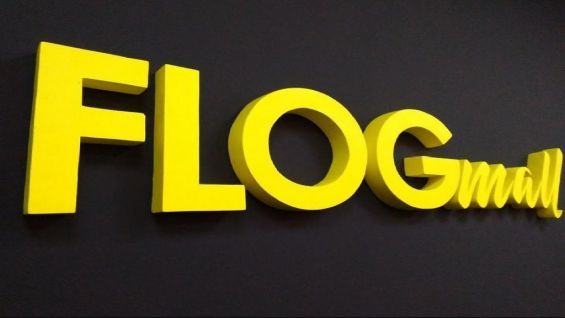 Логотип FLOGmall на темному тлі